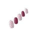 Dottie burgundy and pale pink polka dot nail polish wraps shown on five nail tips