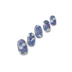 Forget Me Not periwinkle blue floral nail polish wraps with white daisies and pink wildflowers shown on five nail tips