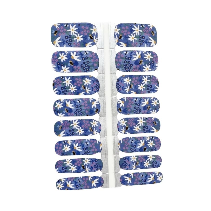 Forget Me Not nail polish wrap sheet in periwinkle blue with white daisies and pink wildflowers