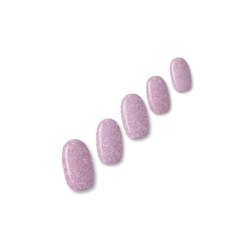 Nevada musky pink glitter nail polish wraps with silver shimmer shown on five nail tips