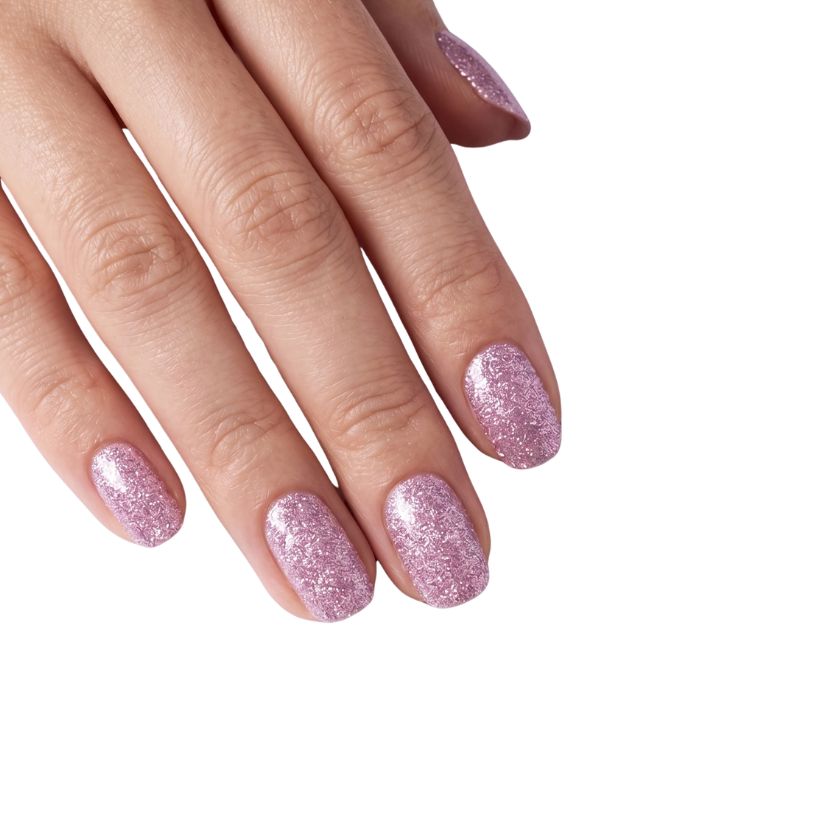 Hand wearing Nevada musky pink glitter nail polish wraps