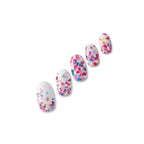 Petulia pearlescent white confetti nail polish wraps with multicoloured petal-shaped spots shown on five nail tips