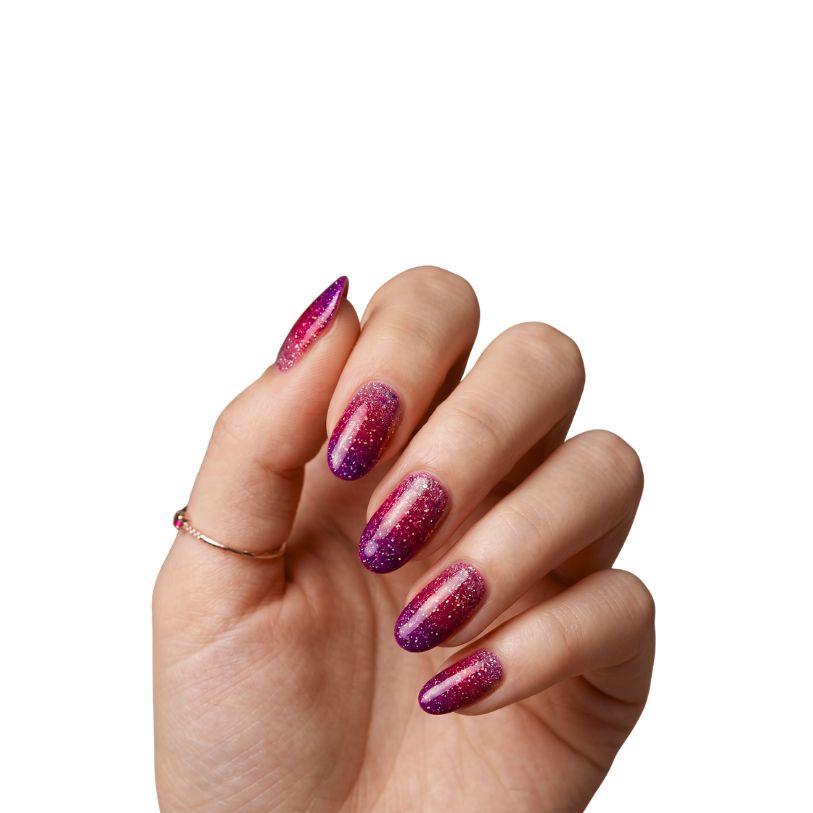 Hand wearing Vegas red and deep purple glitter ombre nail polish wraps