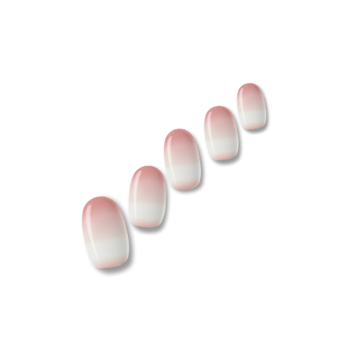 Chloé blush pink to white ombré nail polish wraps shown on five nail tips