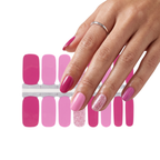 Hand wearing Lola pink nail polish wraps above the 16-strip wrap sheet