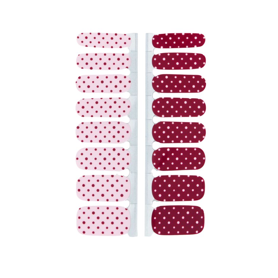 Gel With Us Dottie 16 Strip Nail Wraps showing pink with burgundy polka dots and burgundy with pink polka dots.