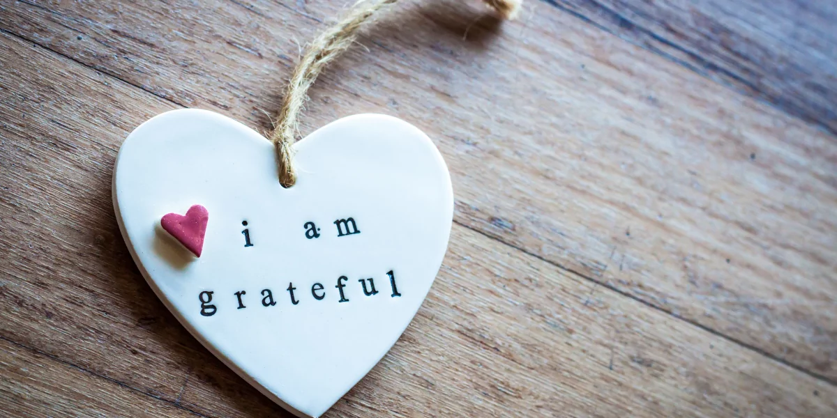 Heart shapped hanging ornament that says I am grateful
