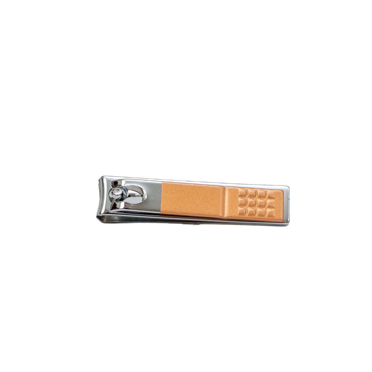 Small metal nail clipper finished off with bronze detailing on the handle.